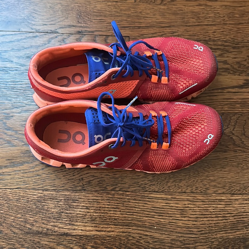 On Running Red and Blue Sneakers